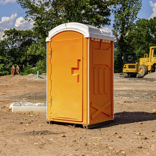 how often are the porta potties cleaned and serviced during a rental period in Halma